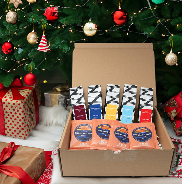 https://landofathousandhills.com/cdn/shop/files/Mini-Bag_Gift-Box_Web-Mockup_AI-christmas-background_600x.jpg?v=1700080084